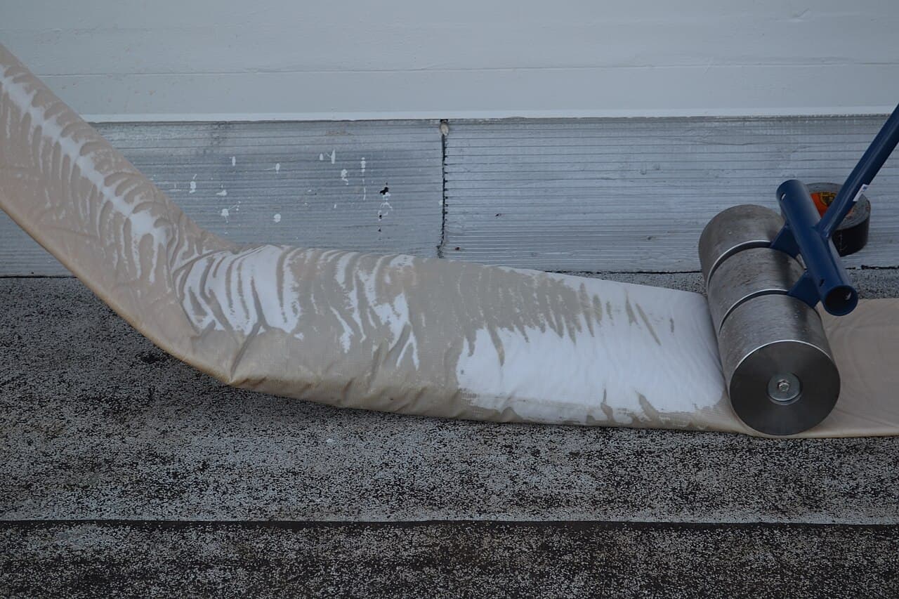 A resin-soaked pipe liner rolled out for a trenchless sewer line repair